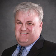 A formal photo portrait of Domonic Purviance.