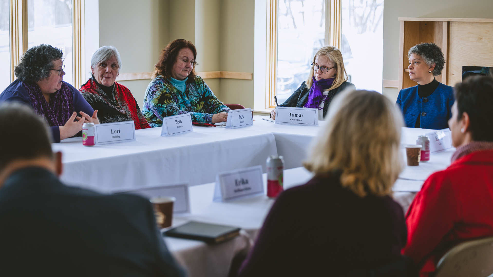 Photo of Susan listening during a roundtable discussion with WCC White River Valley Team.