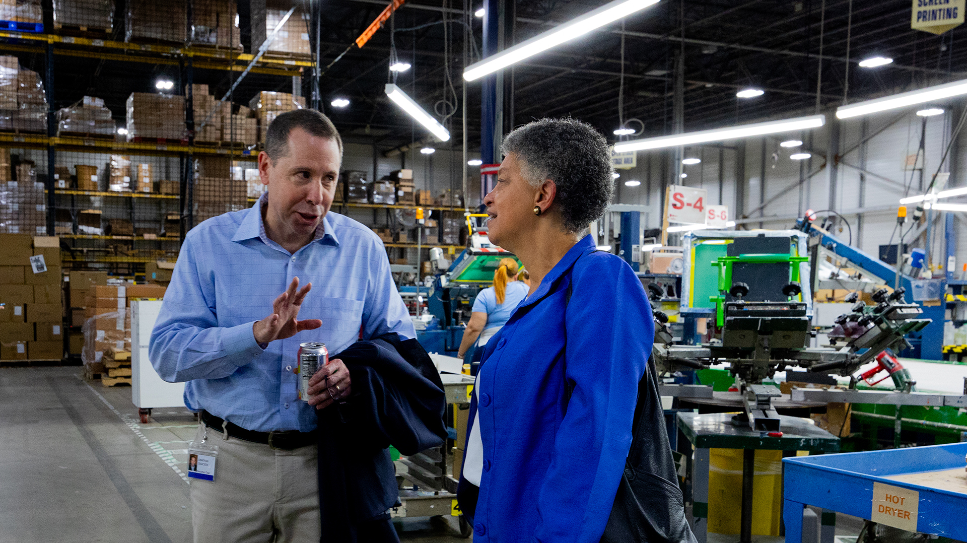 Jonathan Isaacson gives Susan M. Collins a tour of Gemline's design, manufacturing, and quality control facility.