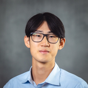 Formal portrait of David Cai.