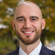 A photograph of Omar Barbiero for the Boston Fed's 69th Economic Conference.