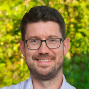 A photograph of Andrei A. Levchenko for the Boston Fed's 69th Economic Conference.