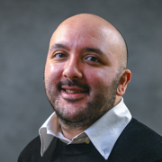 A photograph of Alvaro Silva for the Boston Fed's 69th Economic Conference.