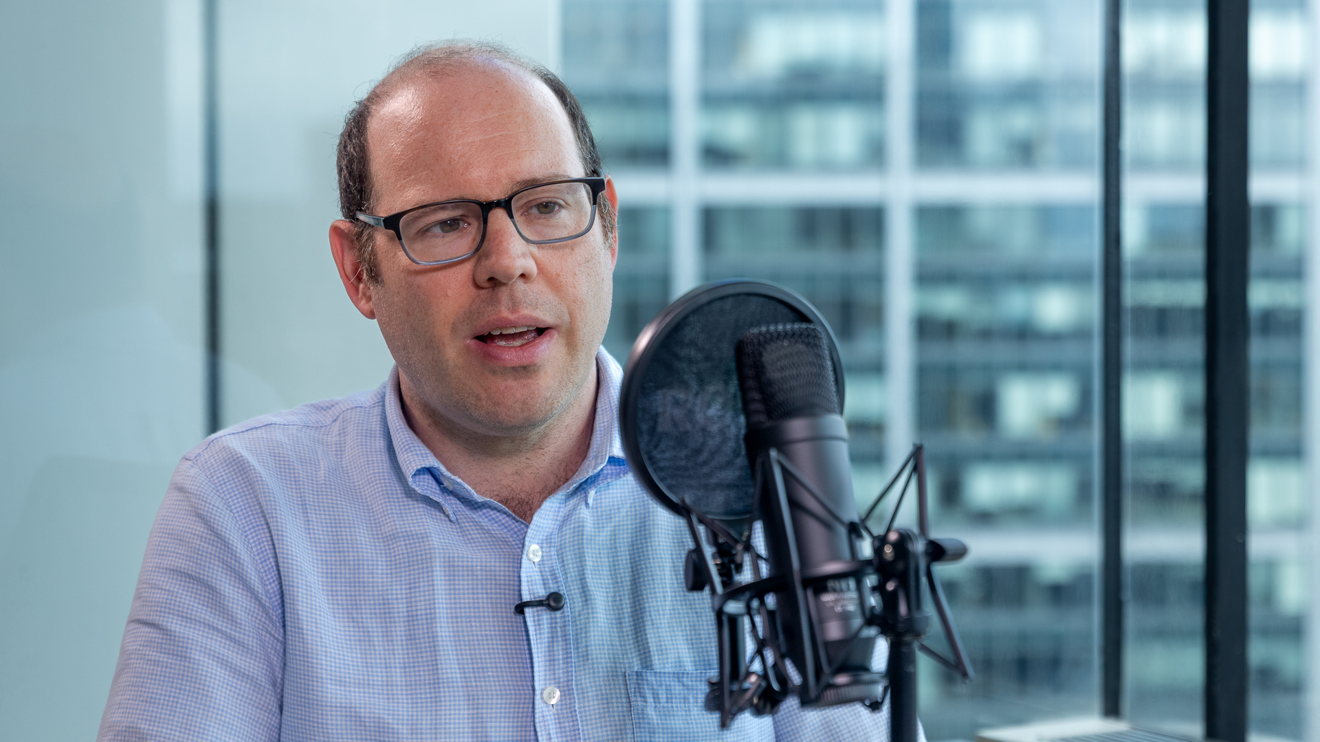 Photo of John Levin speaking about private credit on the Six Hundred Atlantic Podcast.