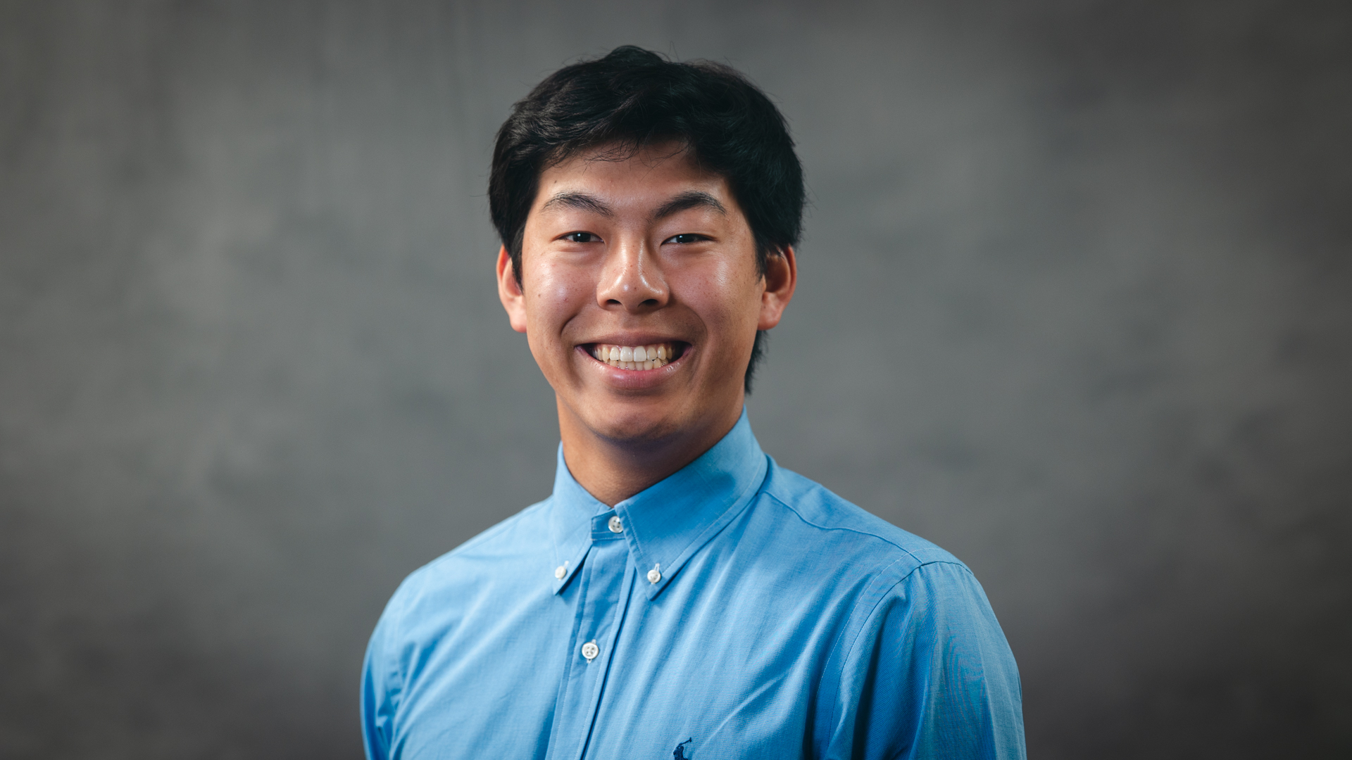 Formal photo of Ian Cheng.