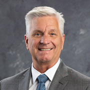 Christopher J. Waller of the Board of Governors of the Federal Reserve System.