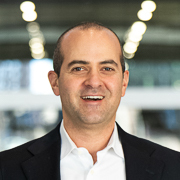 A formal photo portrait of Amitay Kalmar.