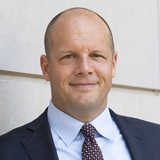 A photograph of Chad Syverson for the Boston Fed's 70th Economic Conference